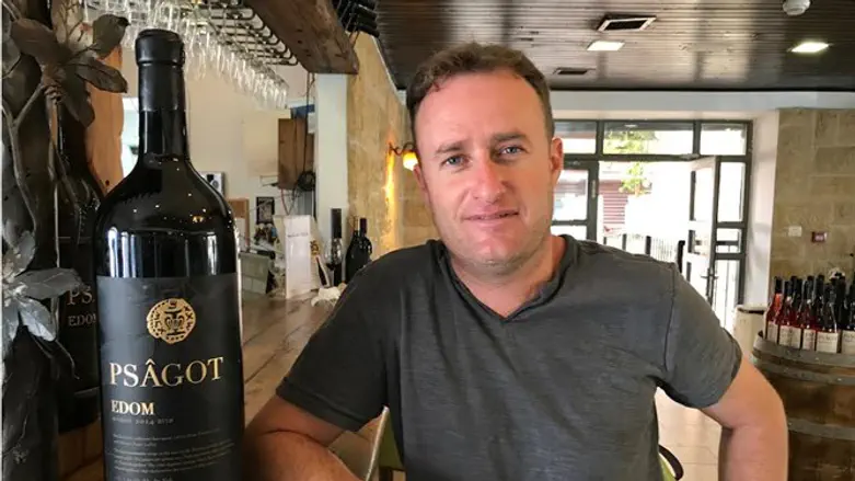 Yaakov Berg posing at his Psagot Winery in Judea and Samaria