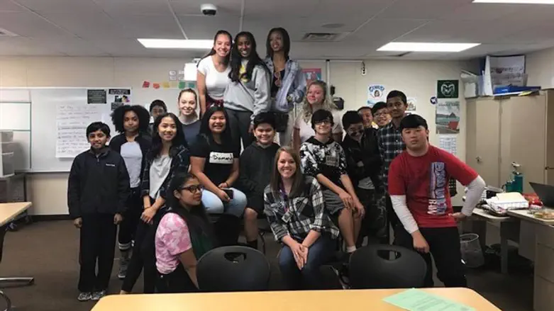 Megan Corbin, shown in front center with her Seattle-area language arts class, emphasizes 