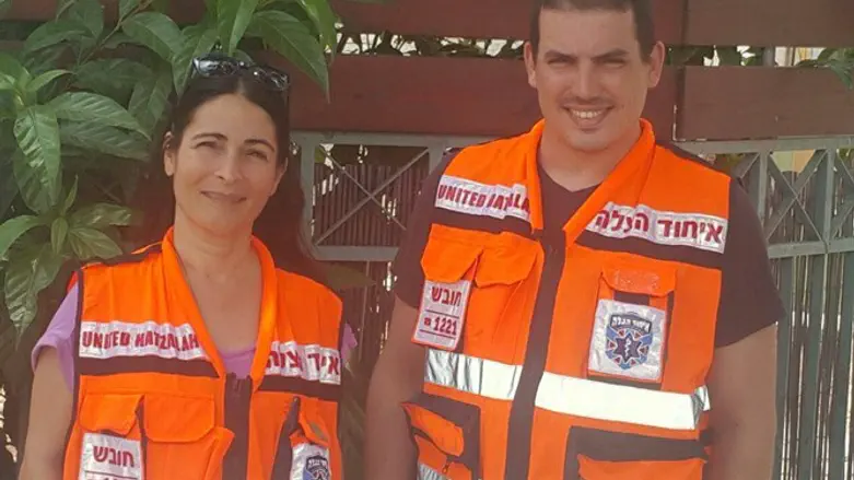 Telem and Zriker pose together after delivering the baby in Modi'in