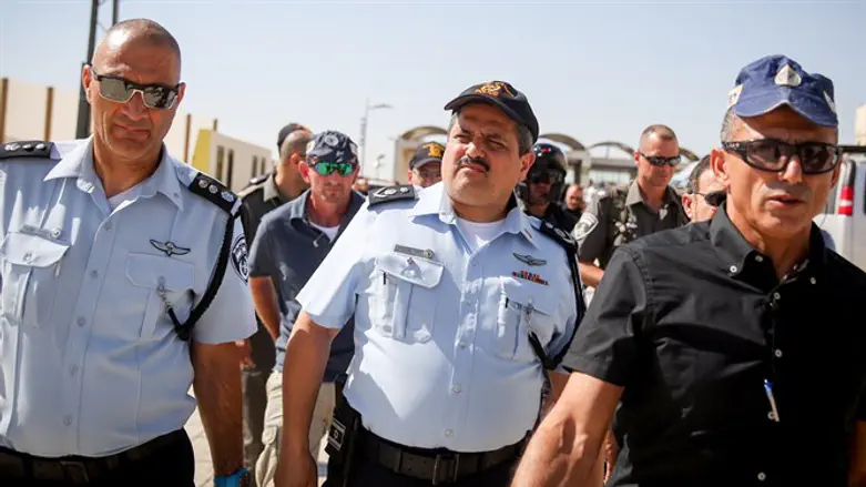 Roni Alsheikh with security forces in Jerusalem