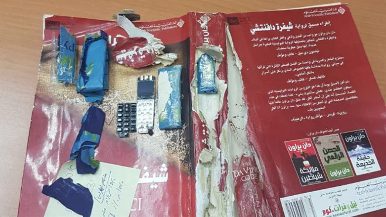 Phones found hidden in book