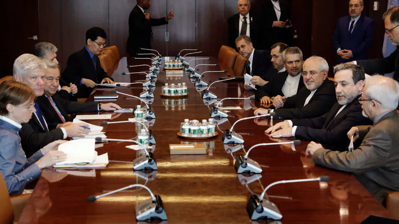 Iran's Foreign Minister Zarif sits with United Nations Secretary-General