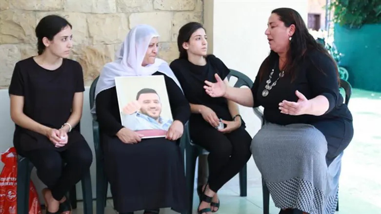 Bereaved mother consoles the bereaved mother