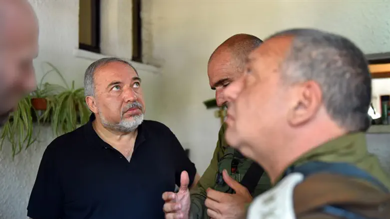 Avigdor Liberman at the scene of the attack
