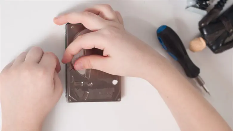 Child plays with screws