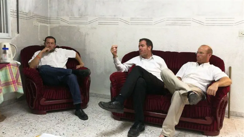 Dagan (L) visiting Machpela House