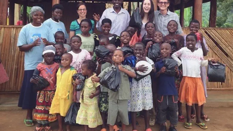Orphans and vulnerable children in eastern Uganda participate in a health workshop where t