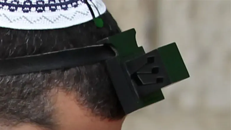 Man in talit and tefilin