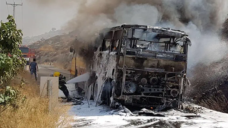 school bus on fire near Psagot
