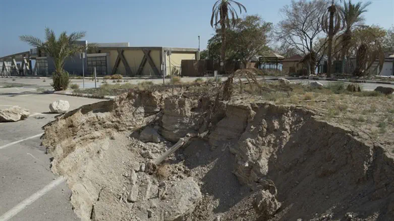 Sinkhole on road near Dead Sea