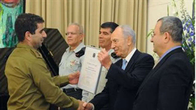 הנשיא בעת חלוקת האותות היום