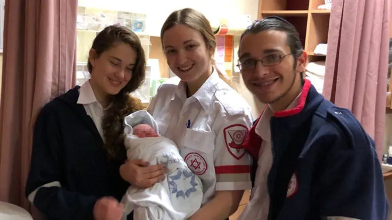 MDA volunteers with baby