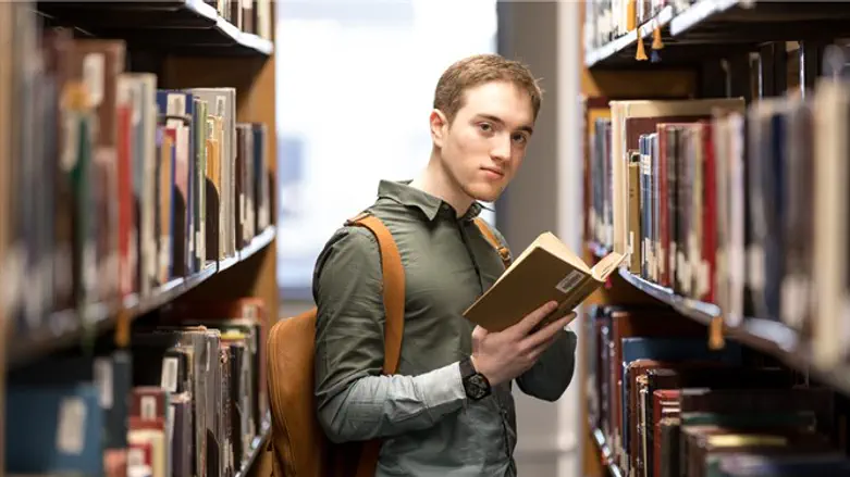 Yechiel Malik is working toward an associate's degree of science in management at Yeshiva 