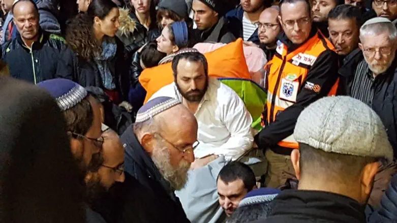 Охад Липник на похоронах детей