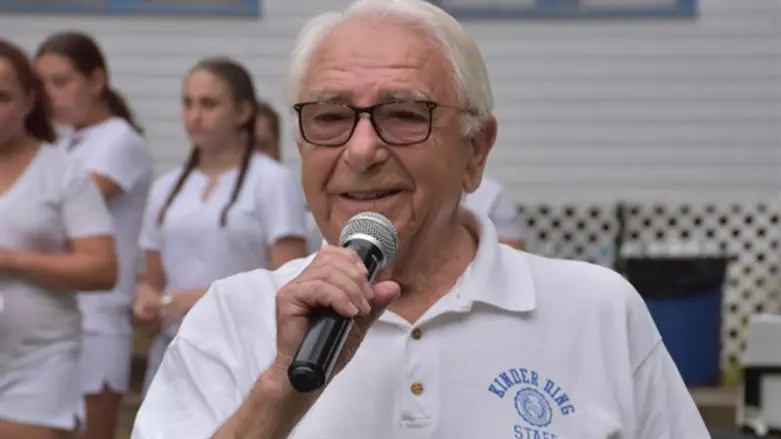 Mikhl Baran, who leads Jewish culture programming at Camp Kinder Ring, speaking at a Frida