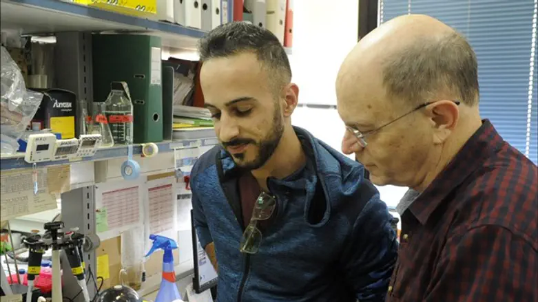 Dr. Yossi Shiloh, right, is a professor of human genetics at Tel Aviv University.