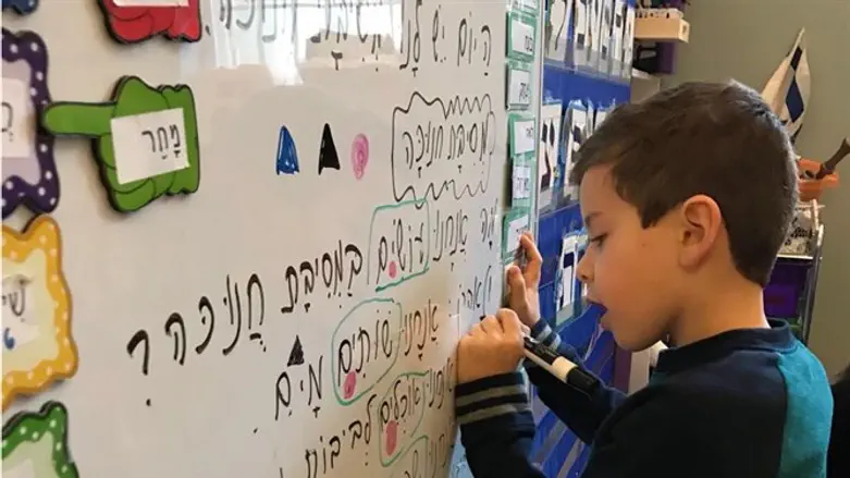 Luria Academy had to adjust its curriculum to accommodate students' increasing fluency.