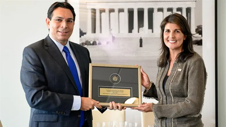 Danon and Haley with ancient coin