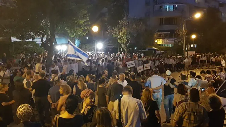 rally near Goldin family house