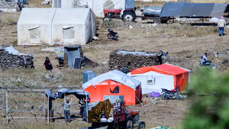 Syrian refugees in tent city near Israeli border