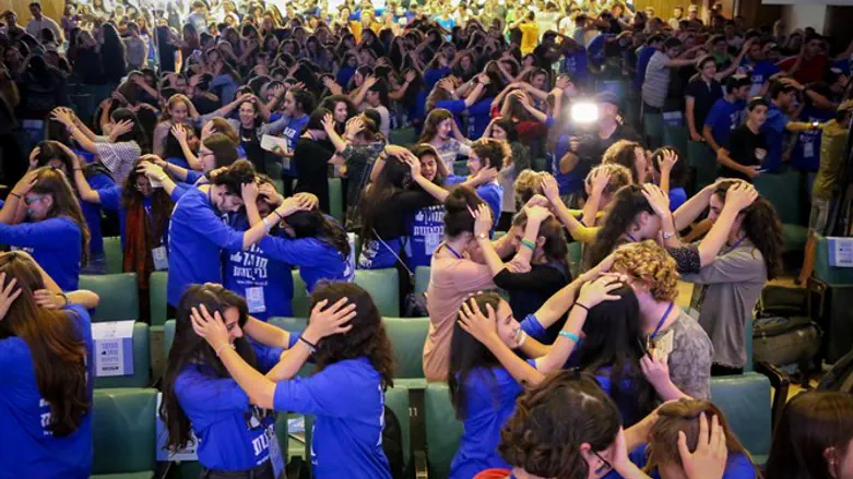 Youth bless each other at first Sovereignty Conference