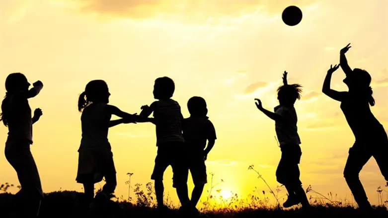 Kids playing volleyball