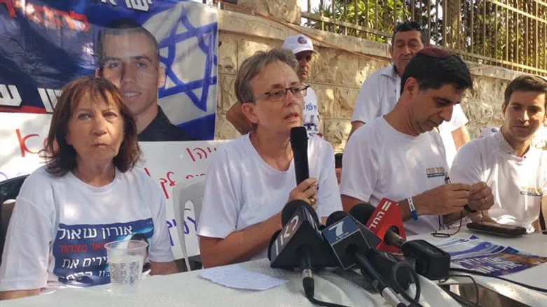 The Shaul and Goldin families outside PM Netanyahu's residence