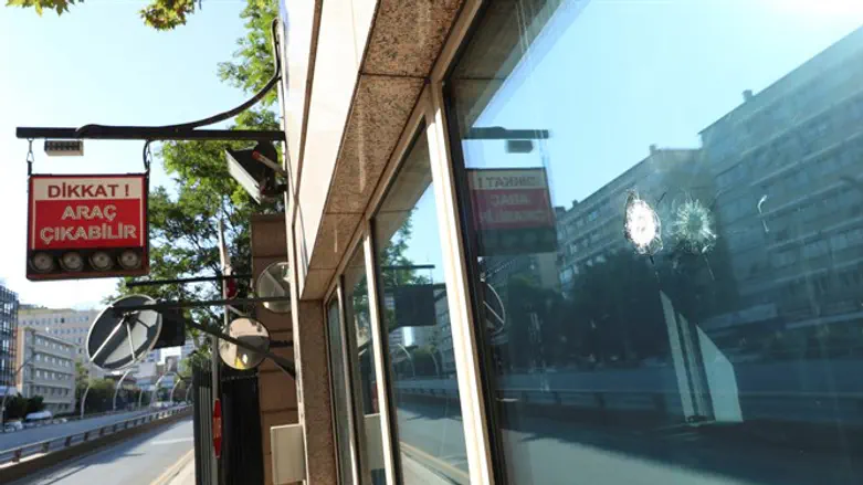Impacts of bullets in window of U.S. Embassy in Ankara