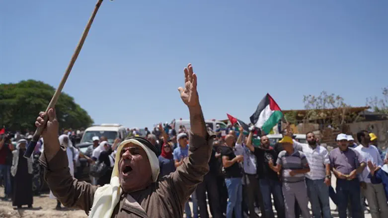 Raising cane in protest of home demolitions