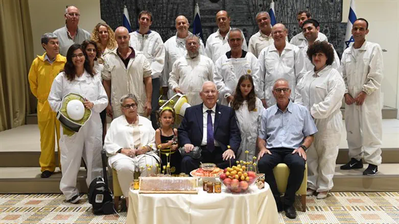 President with beekeepers