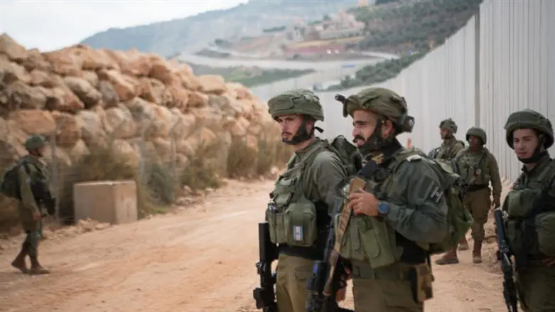 Soldiers near the new barrier