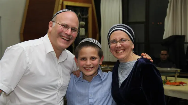 Devra and Gidon Ariel with Chaim Tzvi