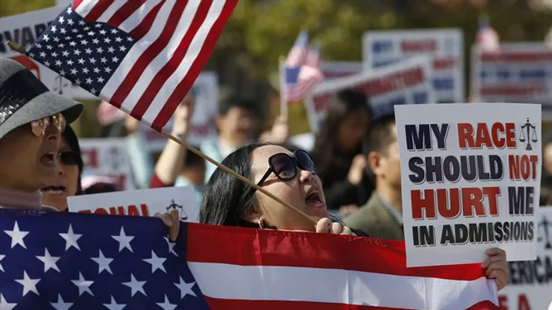 A demonstrator participates in a rally in Boston’s Copley Square