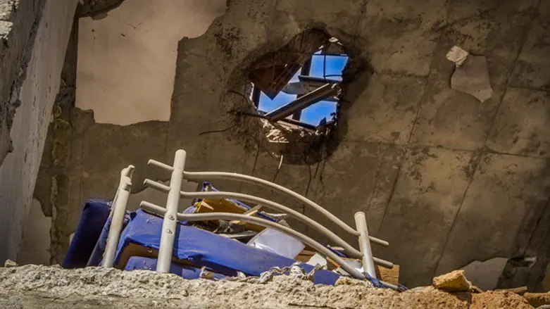 Building hit by rocket fired from Gaza in Beer Sheva