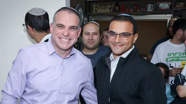 Gracious in victory: Ravivi with challenger Hadida