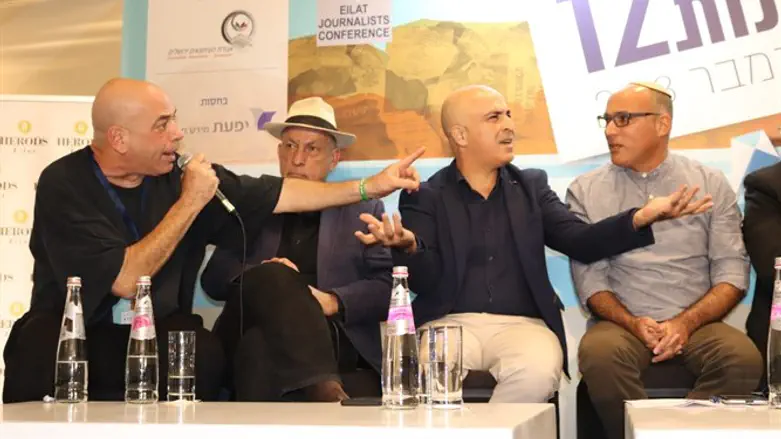 רון קופמן משמאל