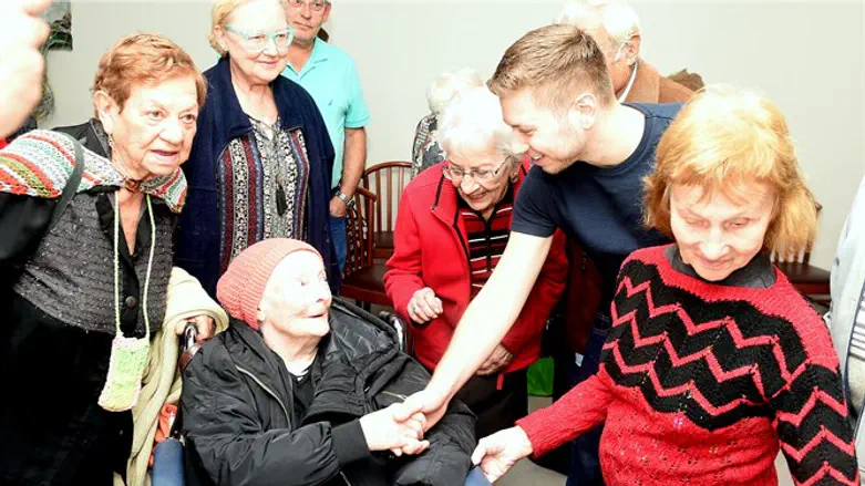 Yair Netanyahu meets Holocaust survivors