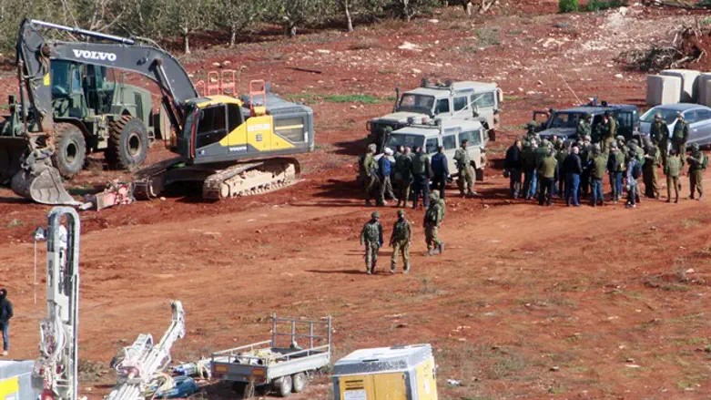 Israeli soldiers seen from village of Kfar Kila