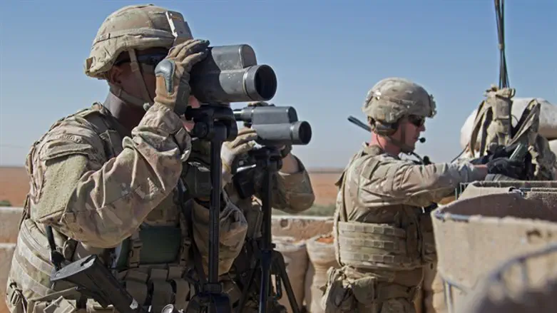 US Soldiers surveil area during combined joint patrol in Manbij