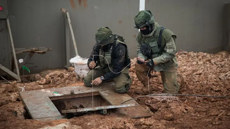 Israeli soldiers stand near tunnel crossing from Lebanon to Israel