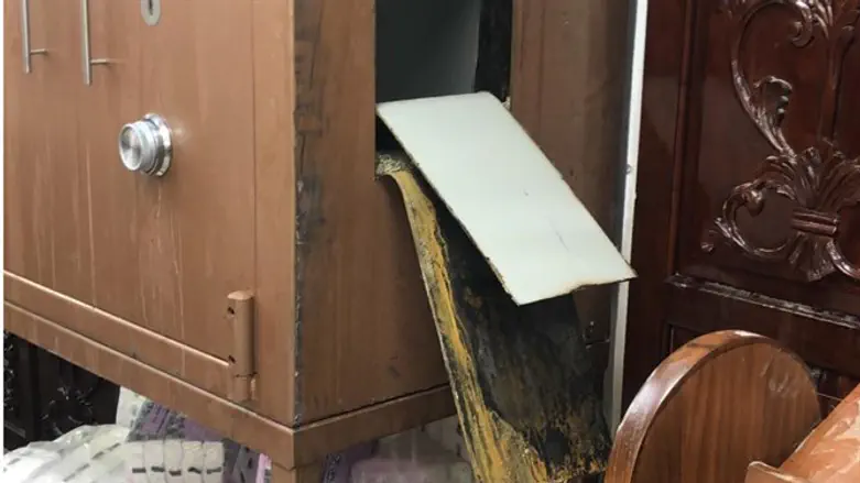 Torah Ark cut open by vandals
