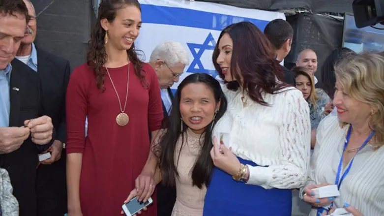 Regev with members of the band