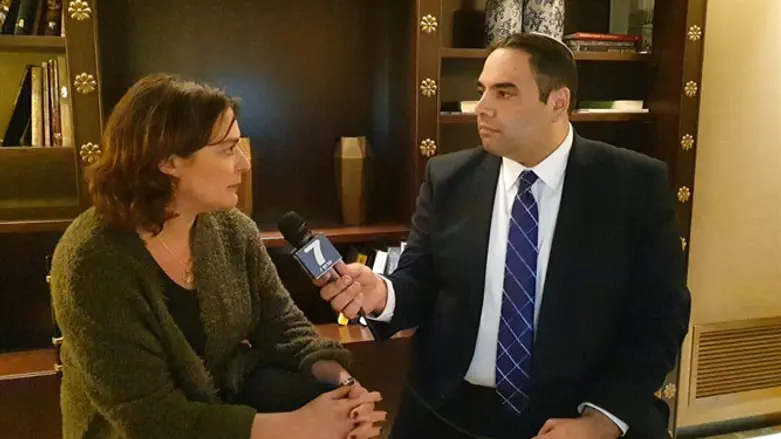 Кэролайн Глик и Узи Барух