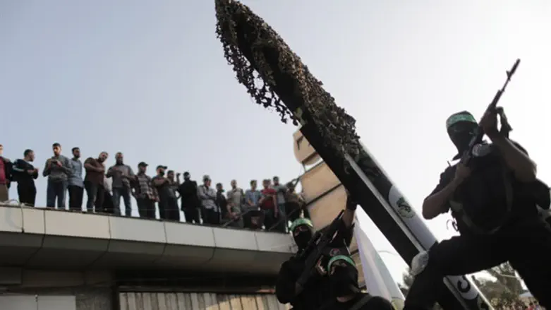 Hamas terrorists parade rockets