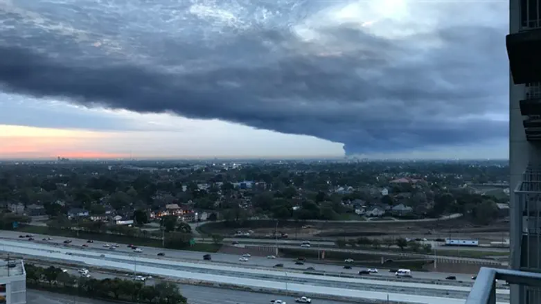 Smoke covers Houston from a fire burning at the Intercontinental Terminals Company