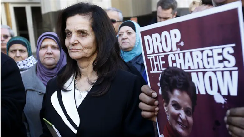 Rasmieh Yousef Odeh stands outside the federal courthouse after her sentencing