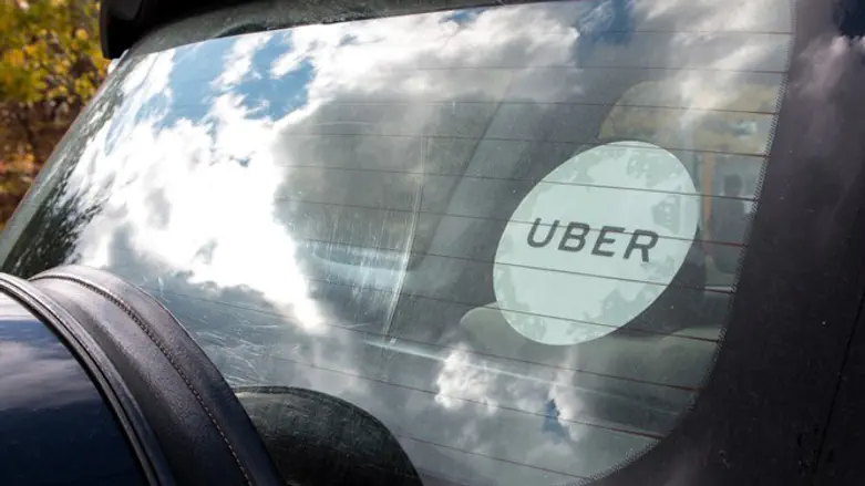 Car with UBER logo