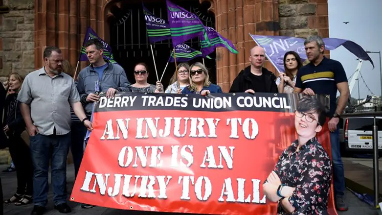 .People attend a vigil at Guildhall for the 29-year-old journalist Lyra McKee