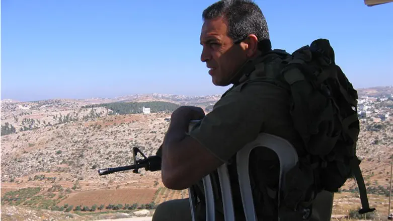 Reserve soldier guarding in Hevron