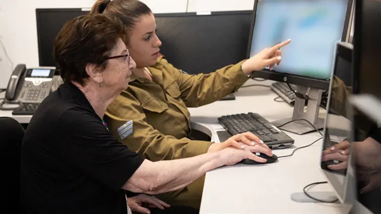 Ida Braunstein and her granddaughter Aya operate the siren
